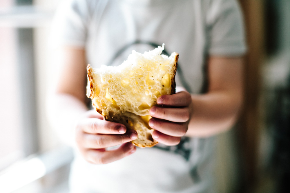go eat your bread with joy - sourdough slice